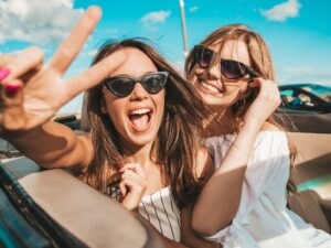 friends peace-signing the camera